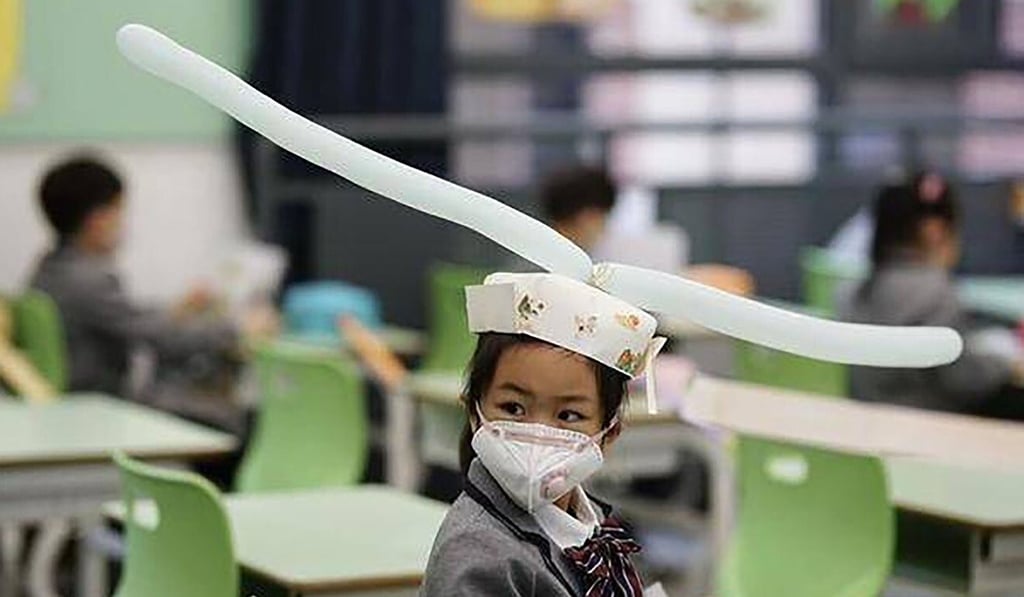 Pupils at a school in Hangzhou made their own versions of the hats. Photo: Weibo