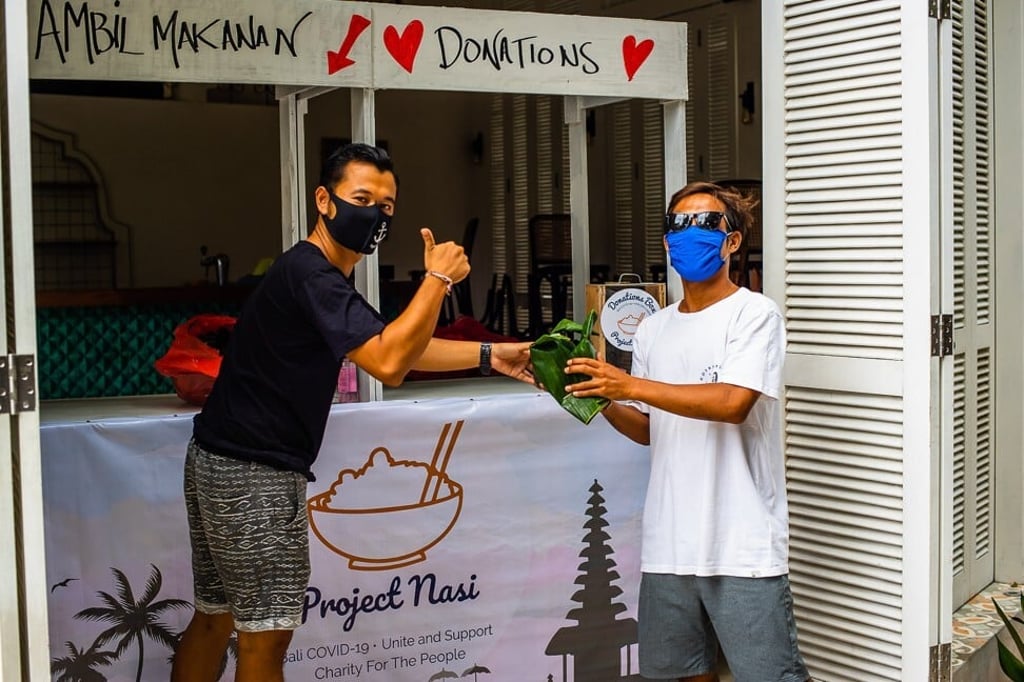 Project Nasi donating food and care packages to those in need on the island. Photo: Project Nasi