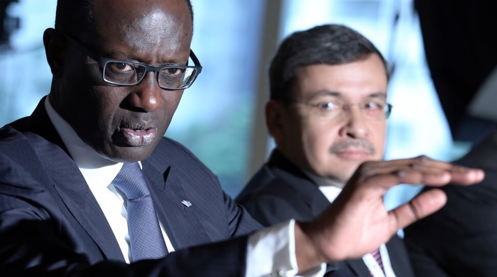 (L-R) Credit Suisse Group’s then CEO Tidjane Thiam and Asia-Pacific CEO Helman Sitohang during a media briefing on 5 April 2016. Photo: Nora Tam