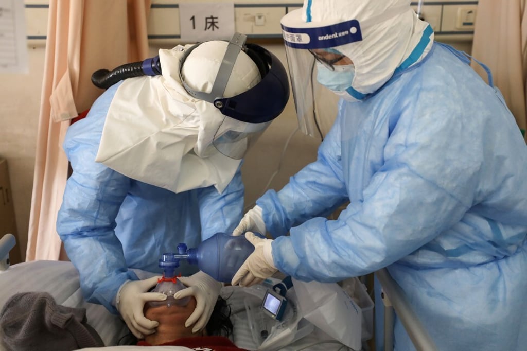 Medical staff treating a patient in Wuhan. More than a third of staff who responded to the pandemic during its peak in China suffered from sleeplessness. Photo: AFP Medical staff treating a patient in Wuhan. More than a third of staff who responded to the pandemic during its peak in China suffered from sleeplessness. Photo: AFP