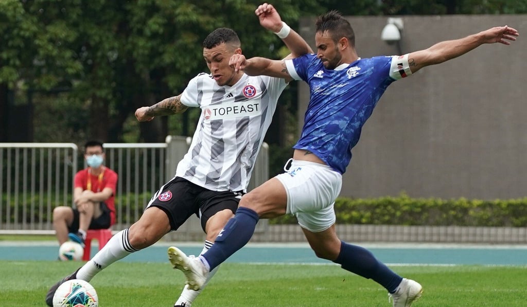 Everton Camargo, of Eastern, is challenged by Tomas Maronesi of BC Rangers during their FA Cup first-round match at Tseung Kwan O Sports Ground. Photo: Felix Wong