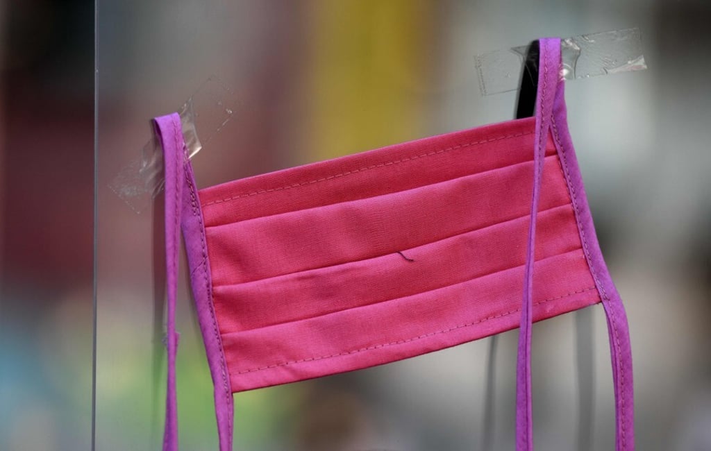 A home-made face mask in a shop in Germany. US officials have said people should not use medical or surgical masks. Photo: AFP A home-made face mask in a shop in Germany. US officials have said people should not use medical or surgical masks. Photo: AFP