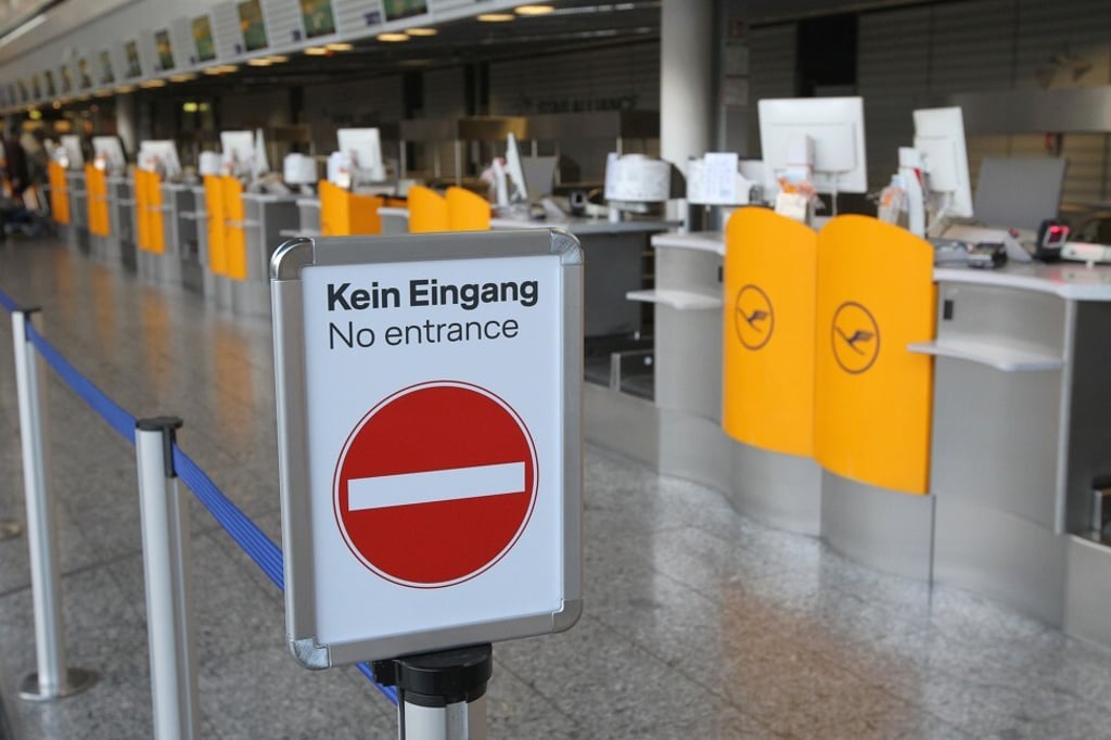 Empty Lufthansa check-in counters at Frankfurt airport, on March 12. Photo: AFP