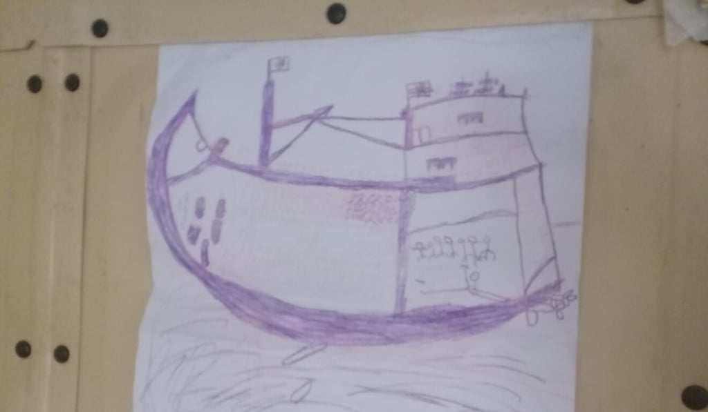 A drawing by a surviving Rohingya refugee child depicting his two months at sea on a wooden trawler en route to Malaysia. Photo: Reuters