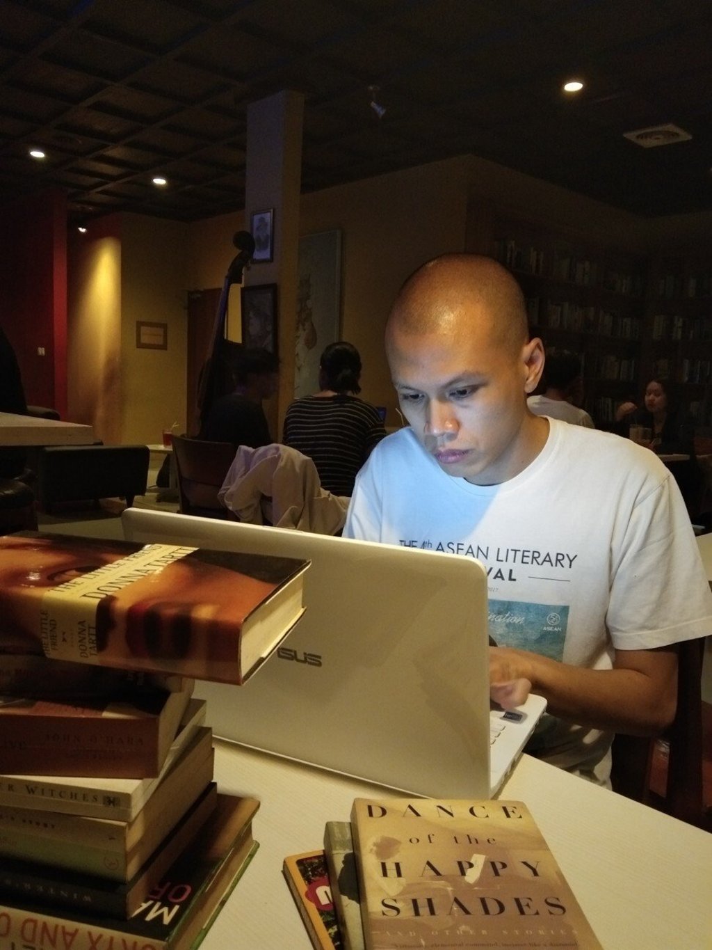 A pre-lockdown Sebastian Partogi at the Reading Room cafe, where the Baca Rasa Dengar book club regularly met. Photo: Pratiwi Juliani