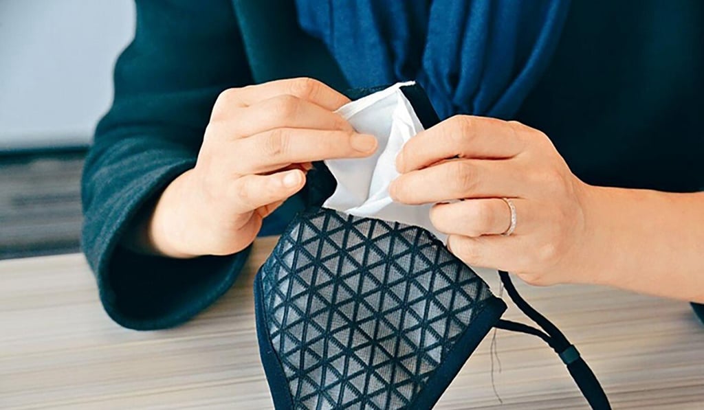 An example of a reusable mask developed by HKRITA. It is known that the version being sent to Hong Kong residents will have certain modifications made and will not be black. Photo: Handout