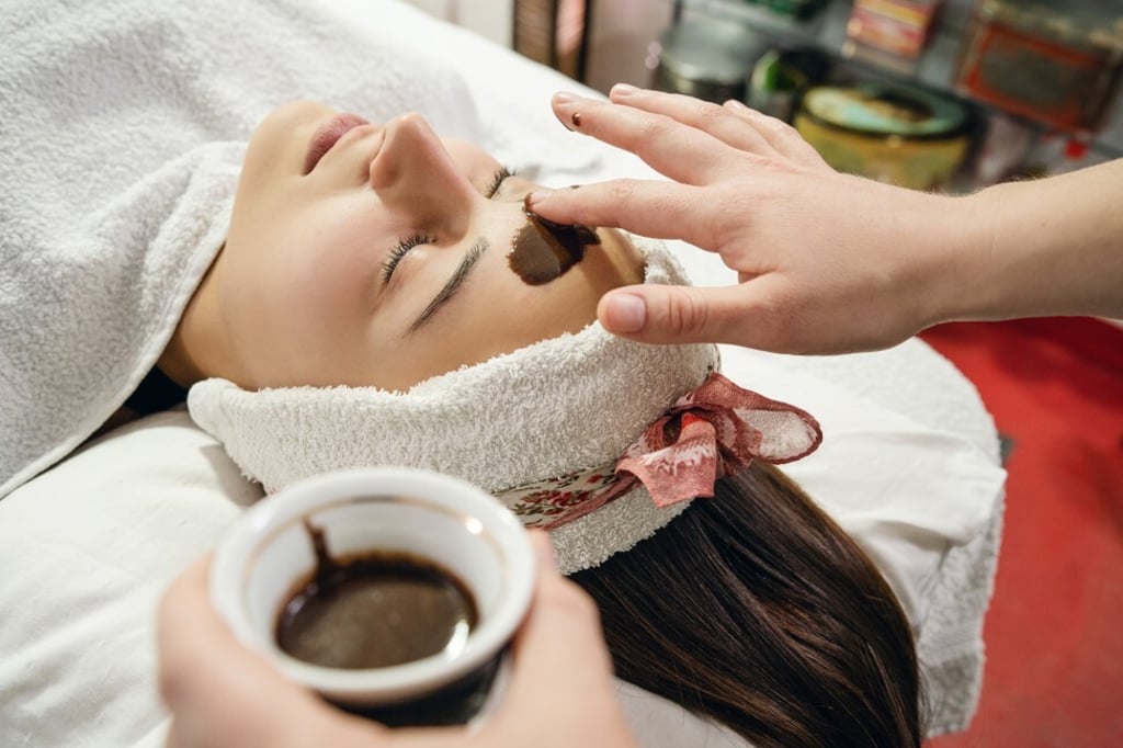Hand-to-face touching – something widely avoided by many in recent months – is an integral part of facials. Photo: Shutterstock Hand-to-face touching – something widely avoided by many in recent months – is an integral part of facials. Photo: Shutterstock