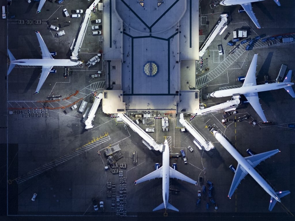 Planes on their stands at Los Angeles airport. Flight and passenger entry restrictions to curb the spread of coronavirus has slashed global travel. Photo: Getty Images