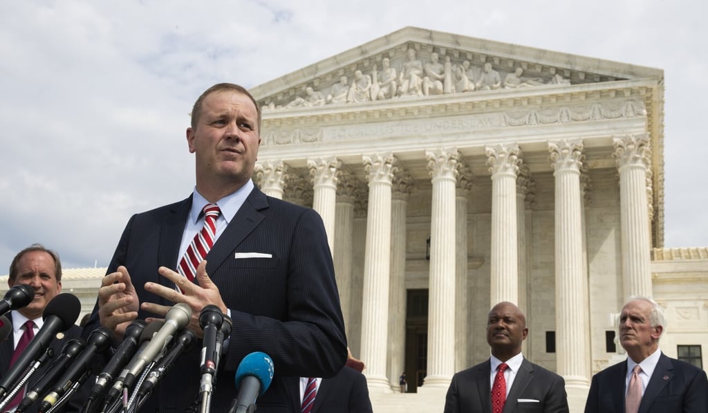 Missouri Attorney General Eric Schmitt speaks in front of the US Supreme Court in Washington on September 9, 2019. On April 21, Schmitt filed a lawsuit against the Chinese government, the Community Party of China and others, alleging that the hiding of information and other actions at the outset of the coronavirus outbreak led to loss of life and significant economic damage in Missouri. Photo: AP