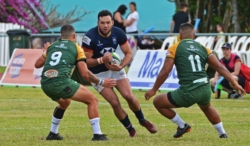 Winger Conor Hartley fronts up to the defence in Rarotonga. Photo: HKRU