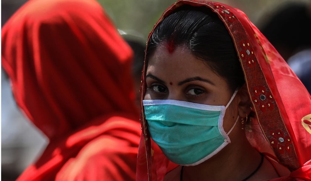 Life under lockdown has put added strain on the lives of many Indian women. Photo: EPA Life under lockdown has put added strain on the lives of many Indian women. Photo: EPA