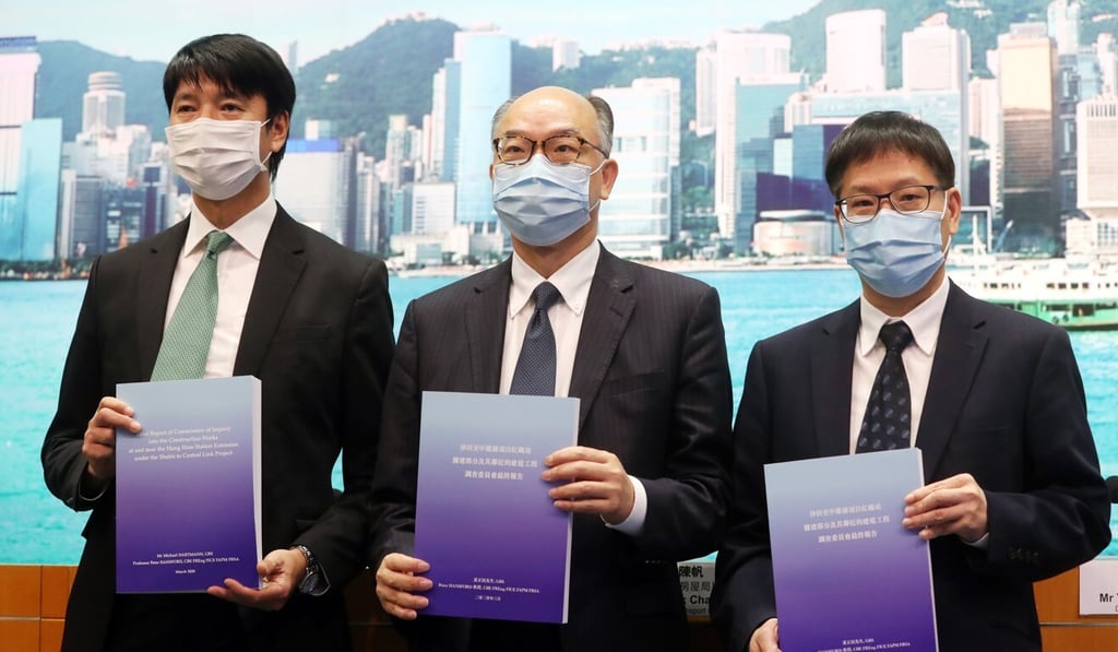 (From left) Director of Highways Jimmy Chan Pai-ming, Secretary for Transport and Housing Frank Chan Fan, and Director of Buildings Yu Tak-cheung attend a Tuesday press conference releasing the final report on the new rail link. Photo: Edmond So