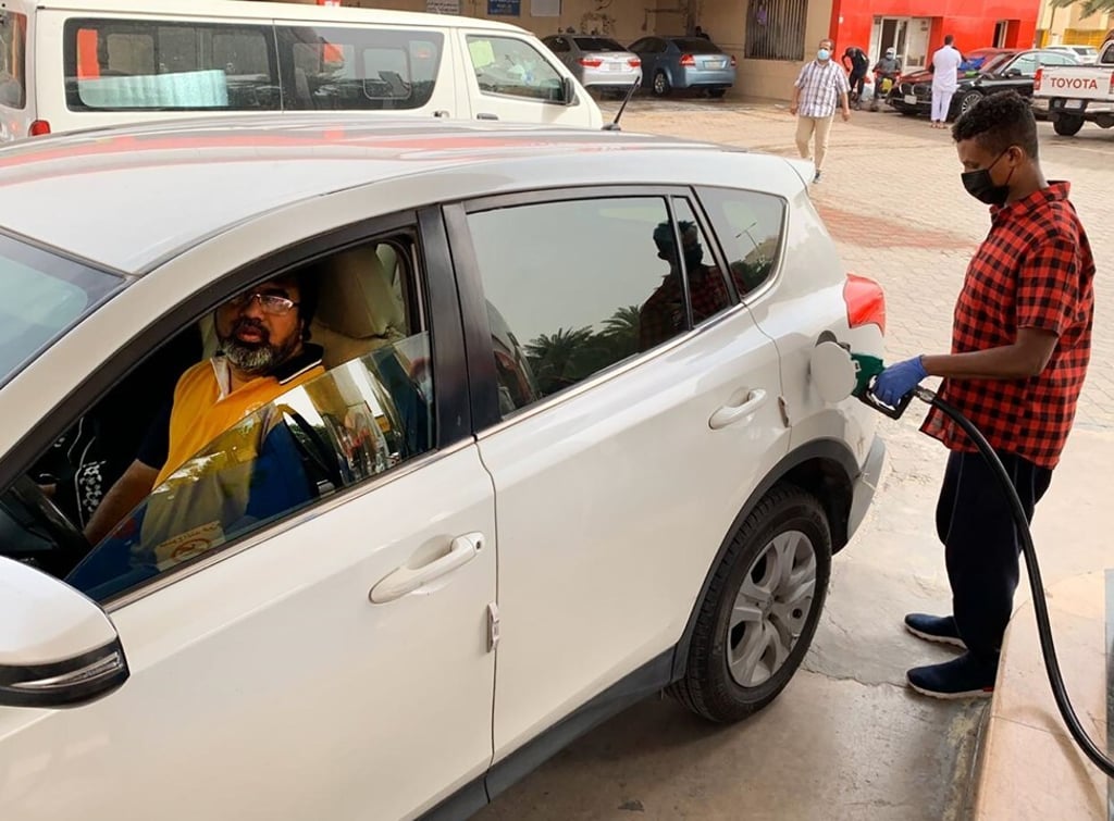 An attendant refills a car at a petrol station in Riyadh, Saudi Arabia, on Monday. Photo: Agence France-Presse An attendant refills a car at a petrol station in Riyadh, Saudi Arabia, on Monday. Photo: Agence France-Presse