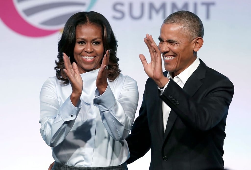 Barack and Michelle Obama will speak at the virtual commencement. Photo: AFP