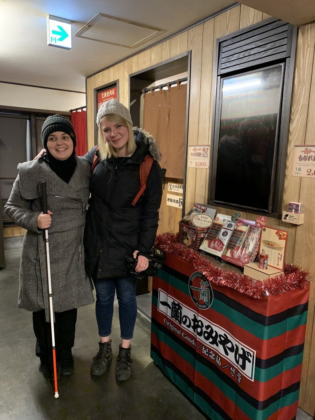 Minkara and her friend and camerawoman Natalie Guse in a Tokyo ramen shop. Photo: courtesy of Mona Minkara Minkara and her friend and camerawoman Natalie Guse in a Tokyo ramen shop. Photo: courtesy of Mona Minkara