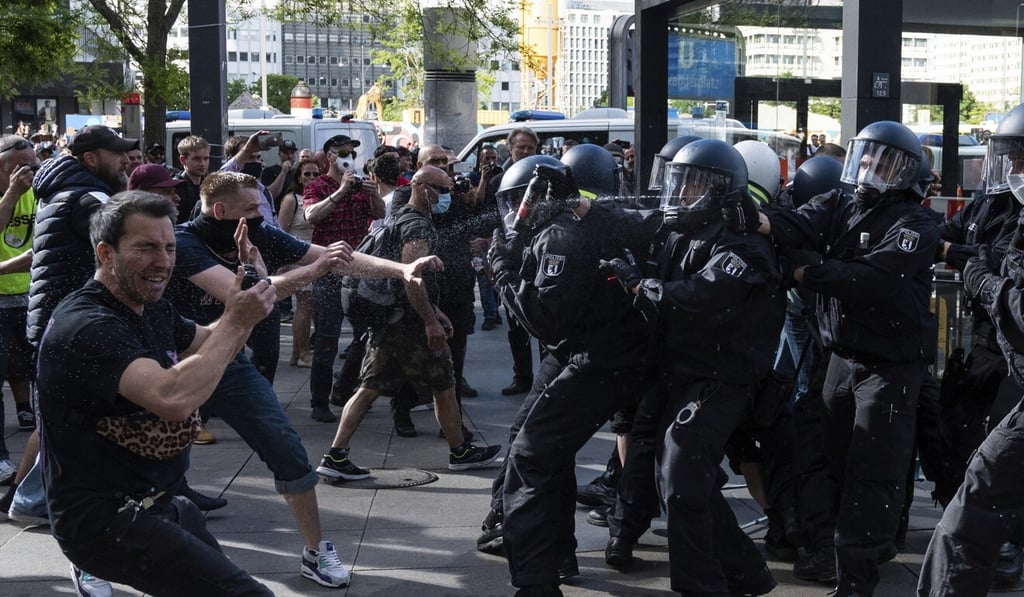 Police use pepper spray at a demonstration in Berlin. Photo: EPA