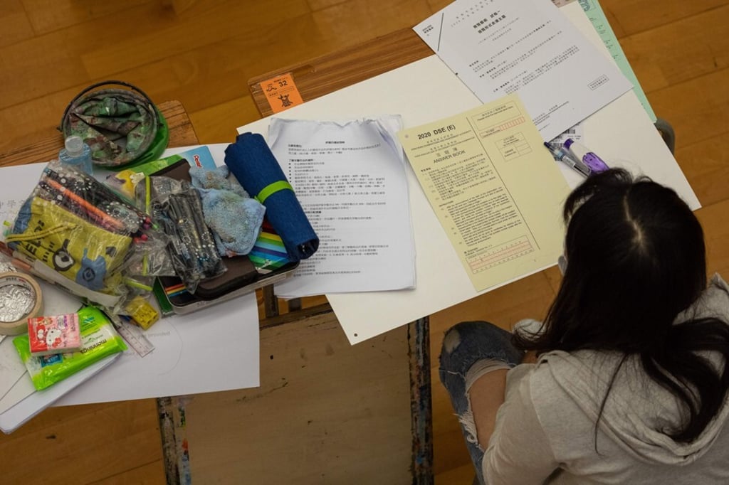A student sits for the Diploma of Secondary Education exam on April 24. In a recent interview, Chief Executive Carrie Lam said schools must ensure misconceptions and “fallacious arguments” are not being taught to impressionable young minds. Photo: AFP A student sits for the Diploma of Secondary Education exam on April 24. In a recent interview, Chief Executive Carrie Lam said schools must ensure misconceptions and “fallacious arguments” are not being taught to impressionable young minds. Photo: AFP