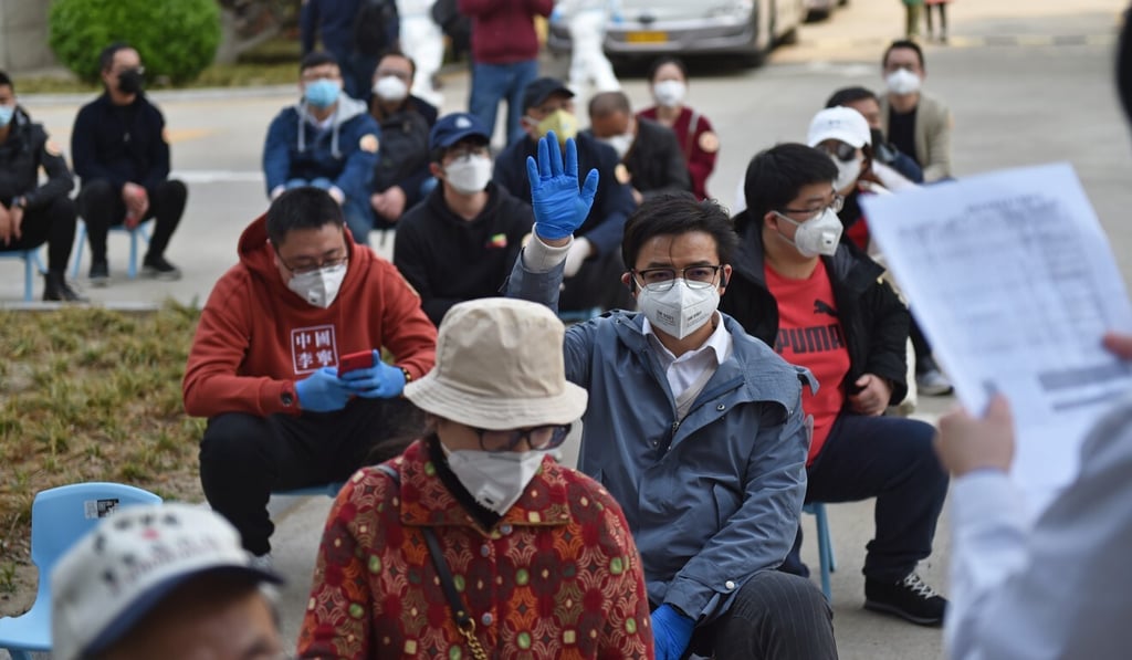 Some local governments in China have added coronavirus tests to basic medical insurance schemes to make them affordable to more people. Photo: Xinhua