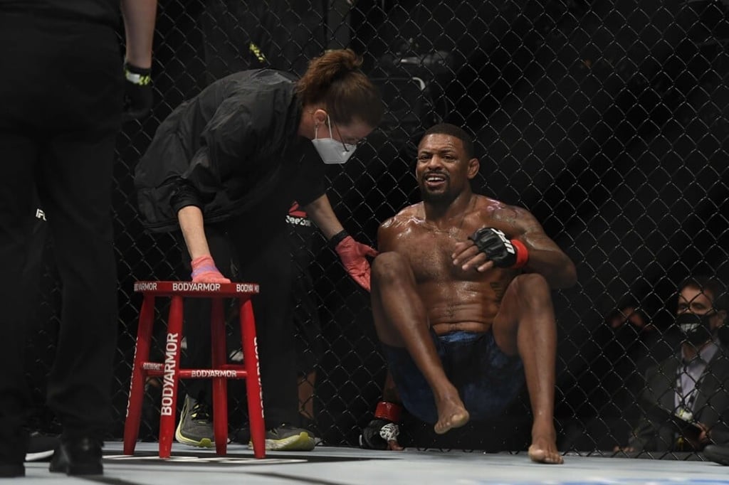 Michael Johnson reacts after being submitted by Thiago Moises.