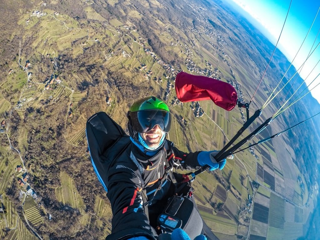 The obligatory selfie while paragliding. Photo: Getty Images