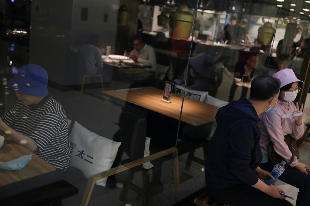 Local governments in China began distributing the coupons to help restaurants and shops hard hit by the pandemic. Photo: Reuters Local governments in China began distributing the coupons to help restaurants and shops hard hit by the pandemic. Photo: Reuters