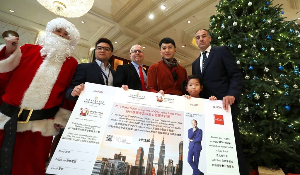 A Christmas singalong at Hong Kong’s Kowloon Shangri-La Hotel in East Tsim Sha Tsui helped raise money for Operation Santa Claus in December. Photo: Edward Wong