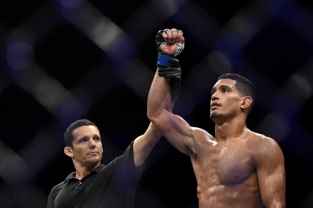 Miguel Baeza celebrates his win against Matt Brown at UFC Fight Night. Photo: AFP Miguel Baeza celebrates his win against Matt Brown at UFC Fight Night. Photo: AFP
