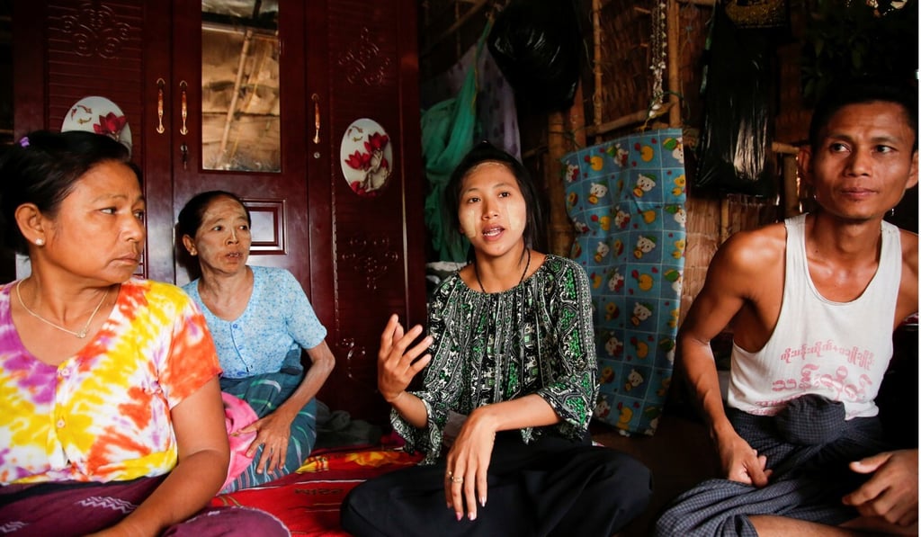 Zar Chi Lwin, centre, pictured in her hostel in an industrial zone on the outskirts of Yangon. Photo: Reuters