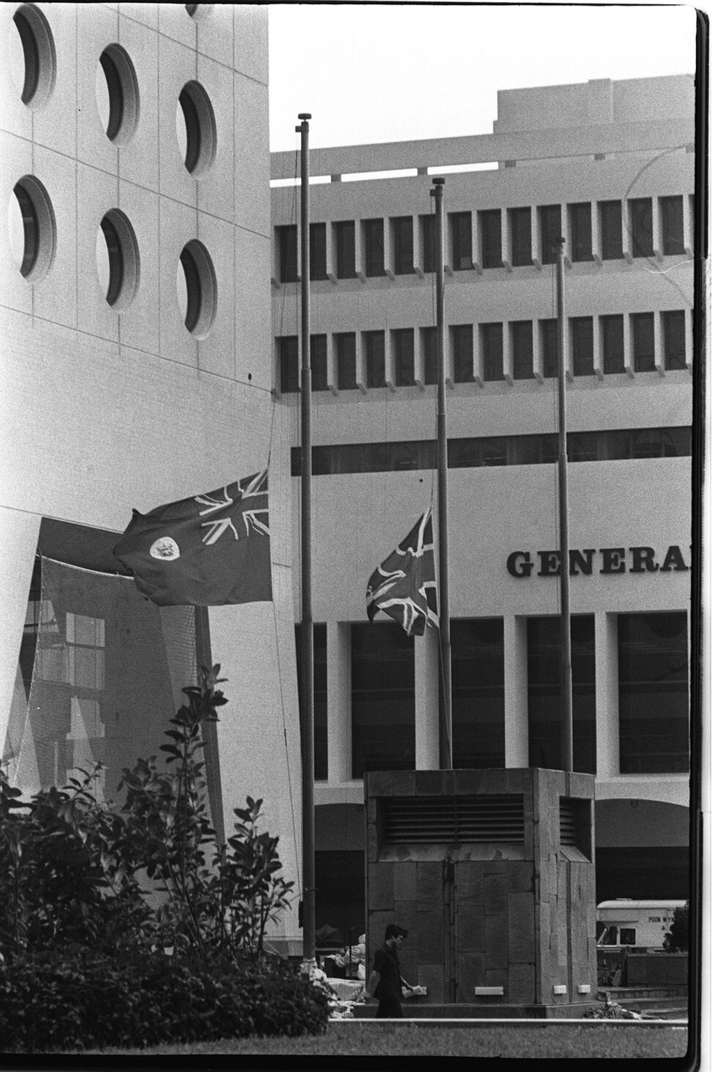 The Hong Kong colonial flag and the Union Jack flying at half mast to commemorate the death of Mao Zedong, in 1976. Photo: SCMP