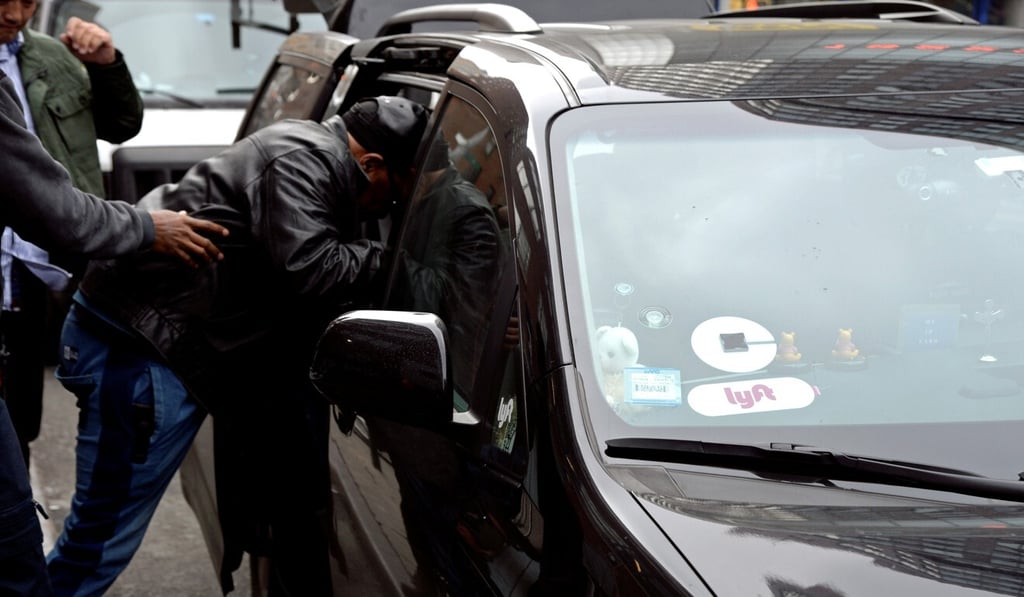 A passenger enters an Uber car in New York City. Photo: Reuters A passenger enters an Uber car in New York City. Photo: Reuters