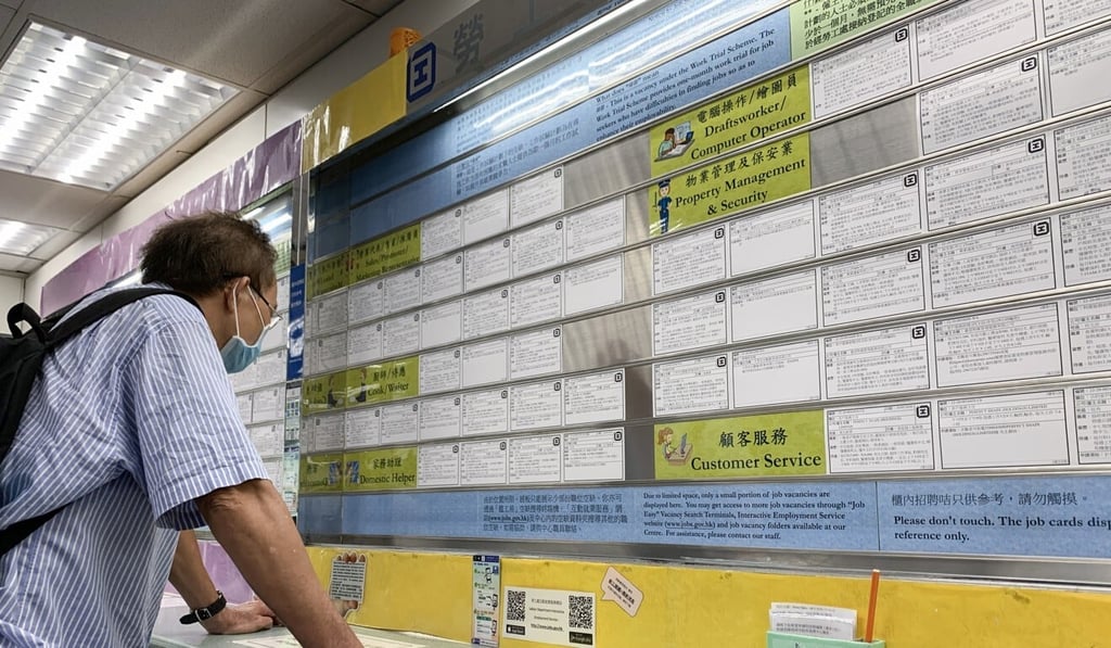 A person scans job listings in Hong Kong. Photo: Nora Tam