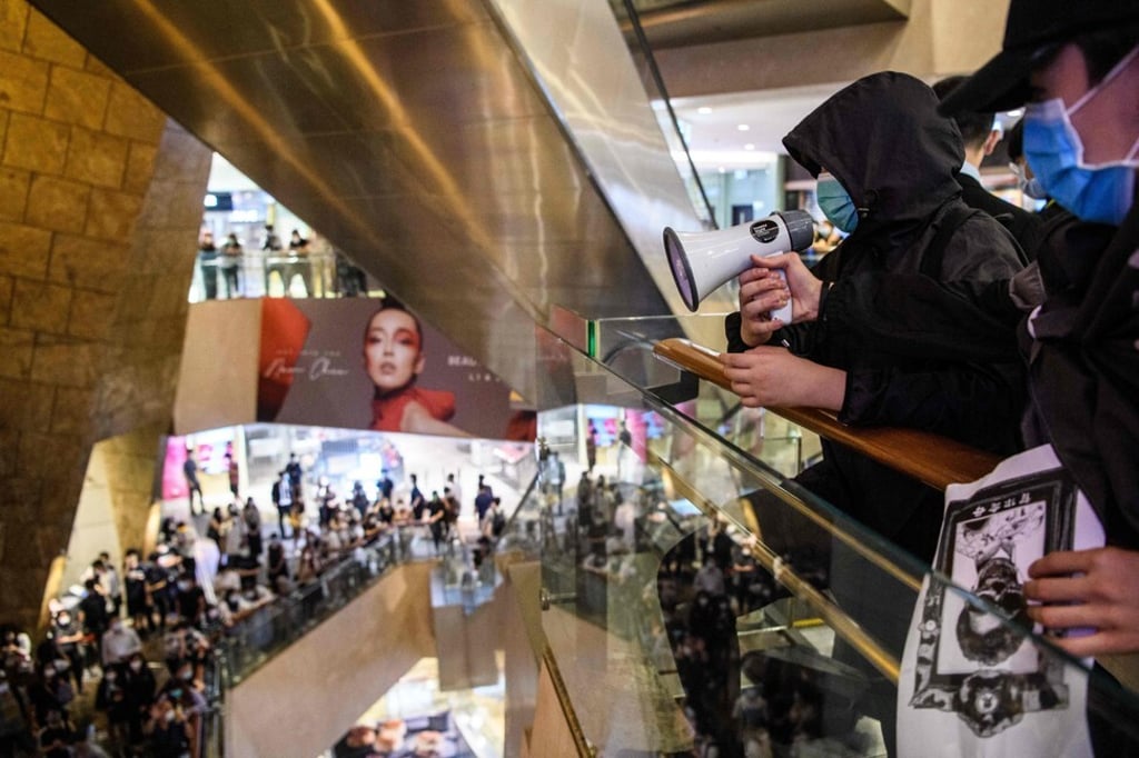 Anti-government protesters at a shopping mall in Hong Kong on May 13, the birthday of the city’s chief executive Carrie Lam. Photo: AFP