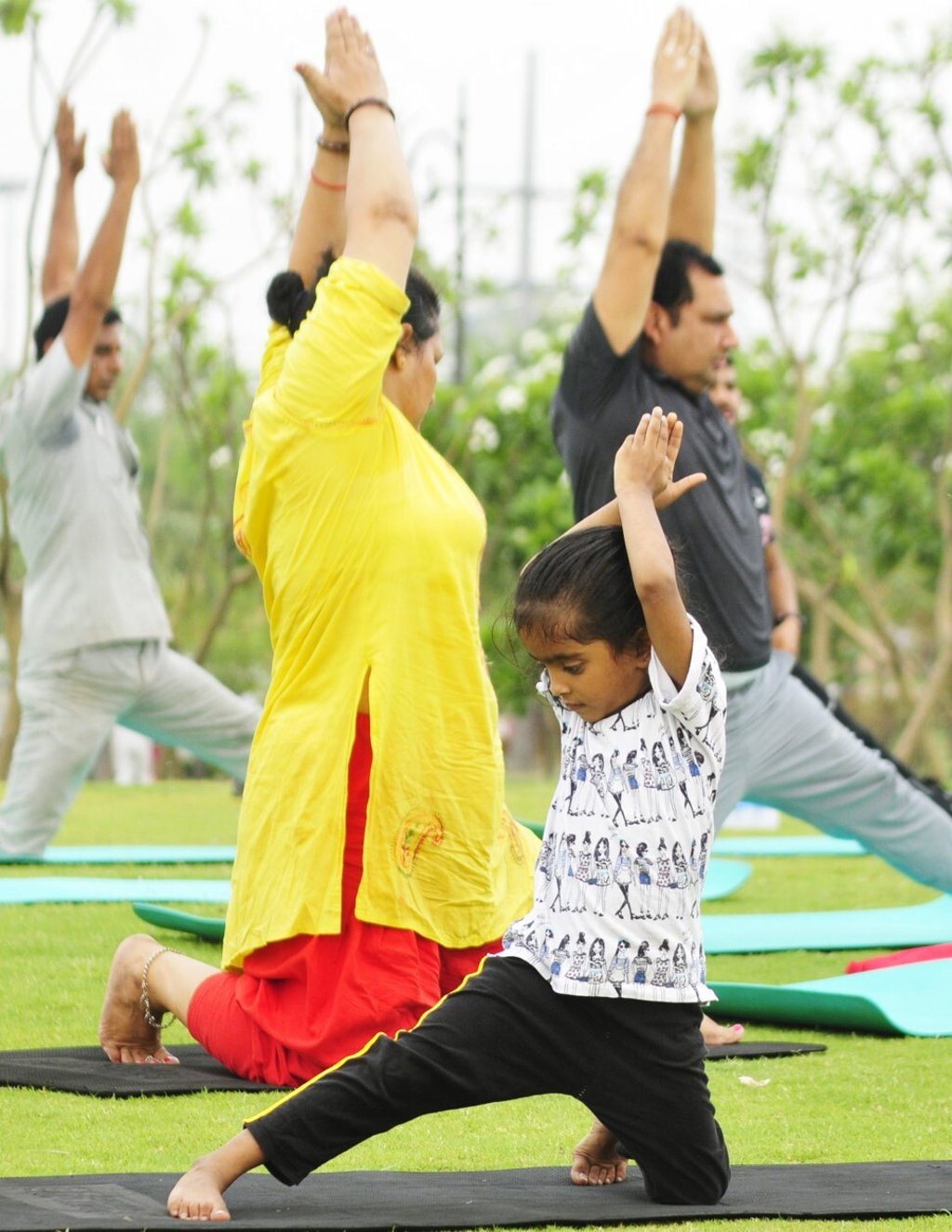 A girl performs yoga on International Yoga Day at Janeshwar Mishra Park in Lucknow, India. It’s one of the many activities parents can do with their child. Photo: Hindustan Times via Getty Images A girl performs yoga on International Yoga Day at Janeshwar Mishra Park in Lucknow, India. It’s one of the many activities parents can do with their child. Photo: Hindustan Times via Getty Images
