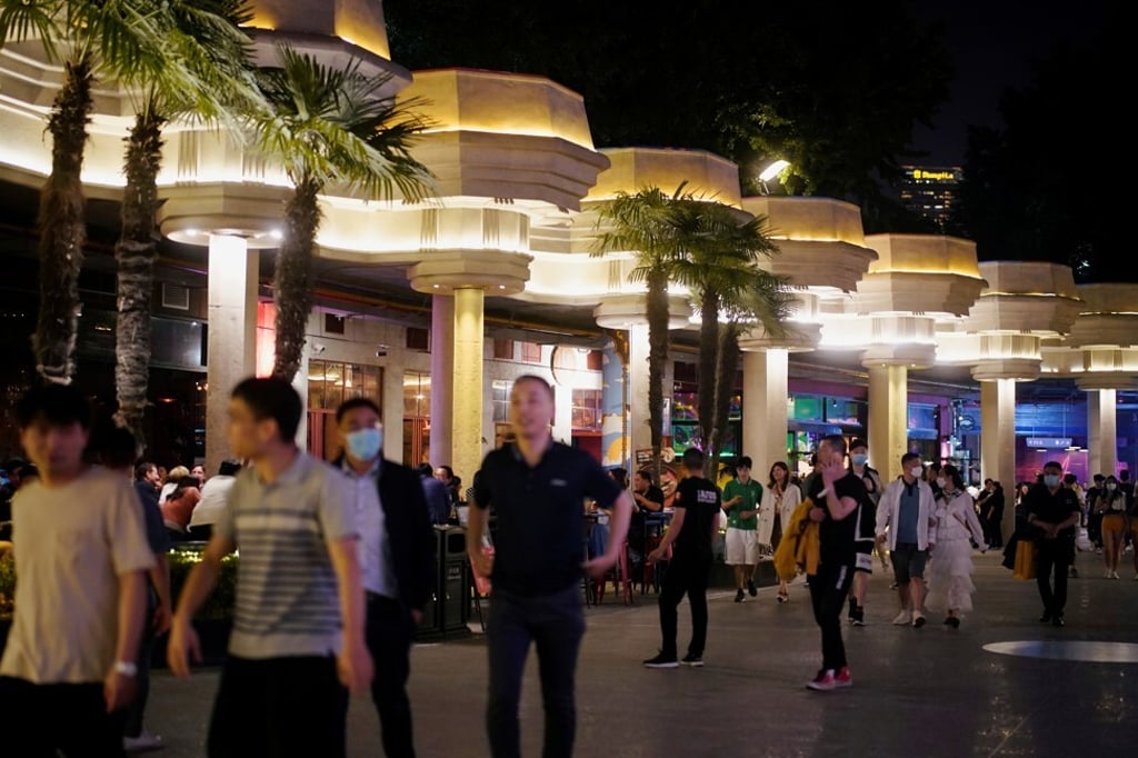 A nightclub and bar area in Shanghai is populated by people in masks in May as clubbers and clients return to entertainment districts. Photo: Reuters