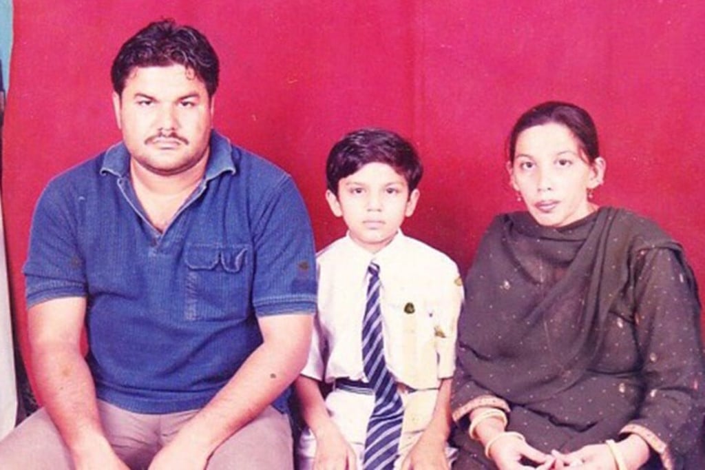 Hilal when he was 10 years old, with his father, Mohammad, and mother, Chaman. Photo: courtesy Eshan Hilal Hilal when he was 10 years old, with his father, Mohammad, and mother, Chaman. Photo: courtesy Eshan Hilal