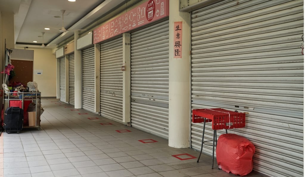 Stores in Singapore’s Tiong Bahru Market are shut during the country’s partial lockdown. Photo: Bloomberg