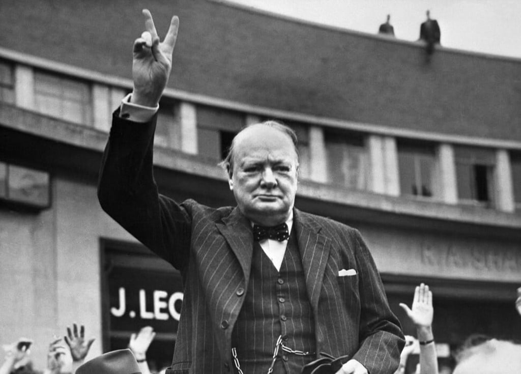 We will watch them on the beaches ... Winston Churchill was never seen without a pocket watch. Photo: AFP