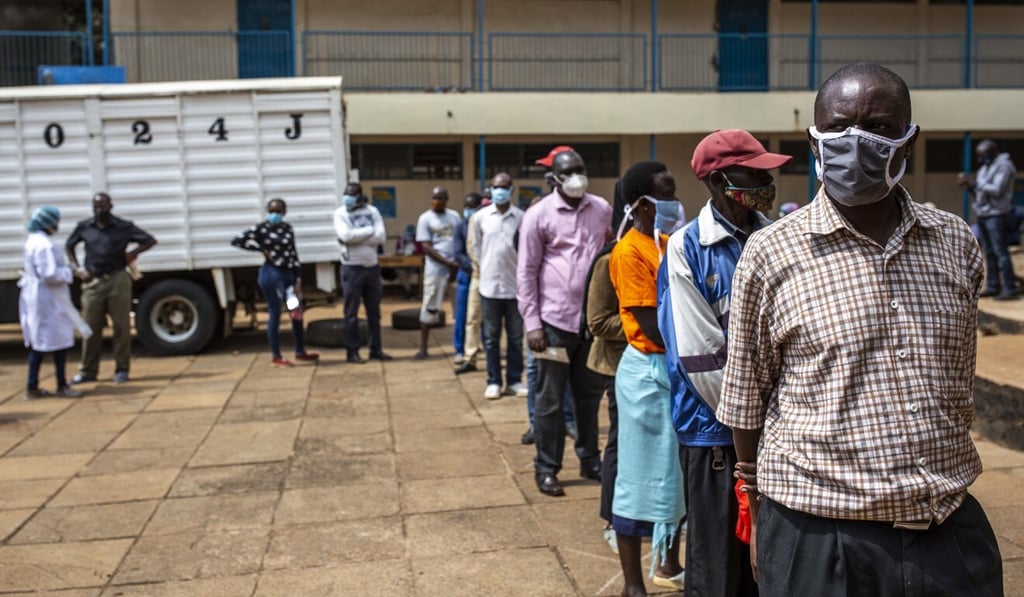 People wait to be tested for Covid-19 at a school in Nairobi, Kenya. Photo: Bloomberg
