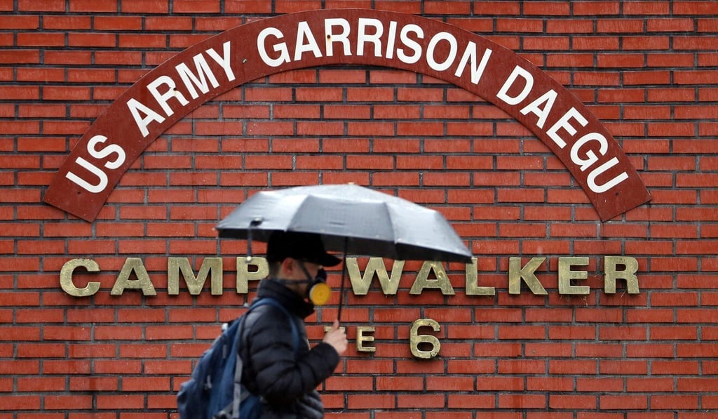 A man walks past a US army base in Daegu, South Korea. Photo: Reuters A man walks past a US army base in Daegu, South Korea. Photo: Reuters