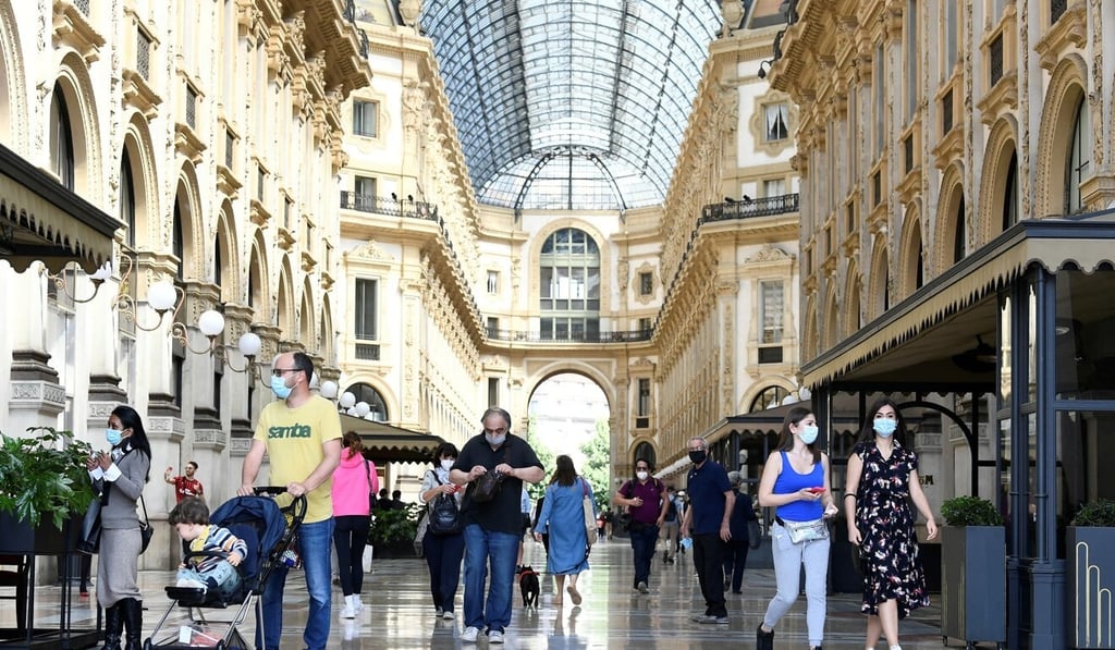 Galleria Vittorio Emanuele II has a few visitors as Italy eases some of its lockdown measures. Photo: Reuters/Flavio Lo Scalzo Galleria Vittorio Emanuele II has a few visitors as Italy eases some of its lockdown measures. Photo: Reuters/Flavio Lo Scalzo