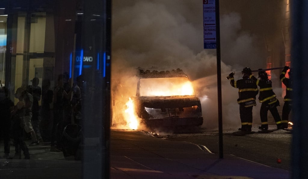 A vehicle burns near New York's Union Square. Photo: AP A vehicle burns near New York's Union Square. Photo: AP