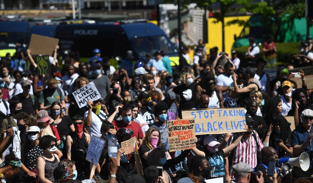 Supporters of the Black Lives Matter movement gather to protest in London. Photo: EPA Supporters of the Black Lives Matter movement gather to protest in London. Photo: EPA