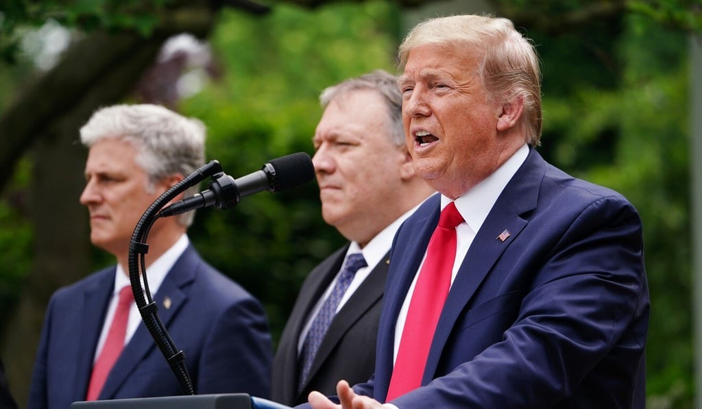 US President Donald Trump (right), who last week threatened sanctions over Hong Kong’s perceived lack of autonomy, on Tuesday called for strong action against US rioters. Photo: AFP
