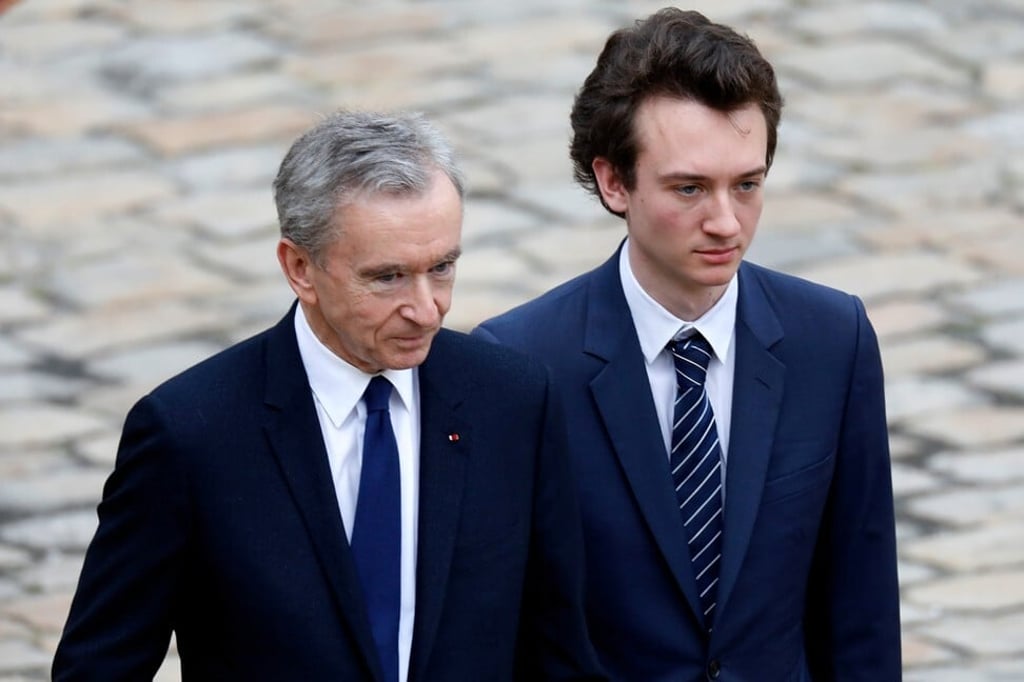 LVMH luxury group chief executive Bernard Arnault (left) and his son Frederic Arnault. Photo: Reuters