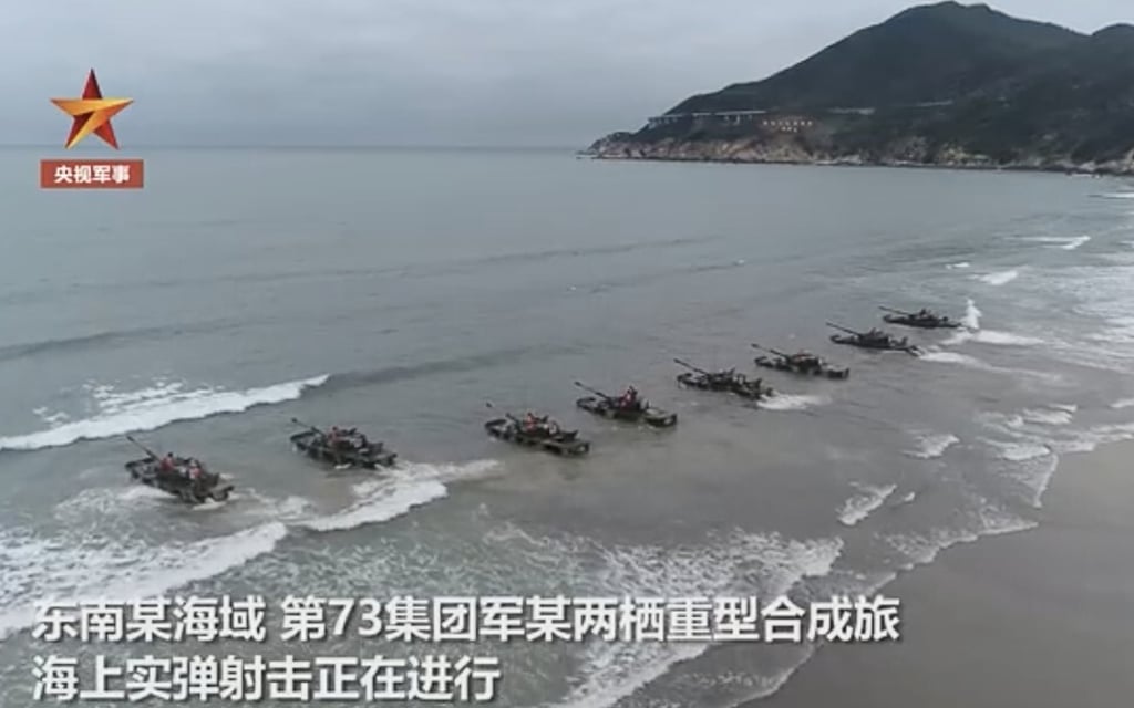 The PLA’s amphibious tanks are shown storming beaches on Chinese state television on Wednesday. Photo: CCTV