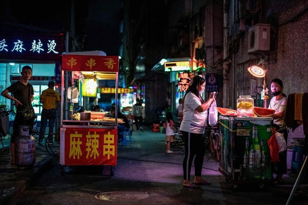 A street vendor sells fruit in the south China city of Shenzhen. Photo: AFP