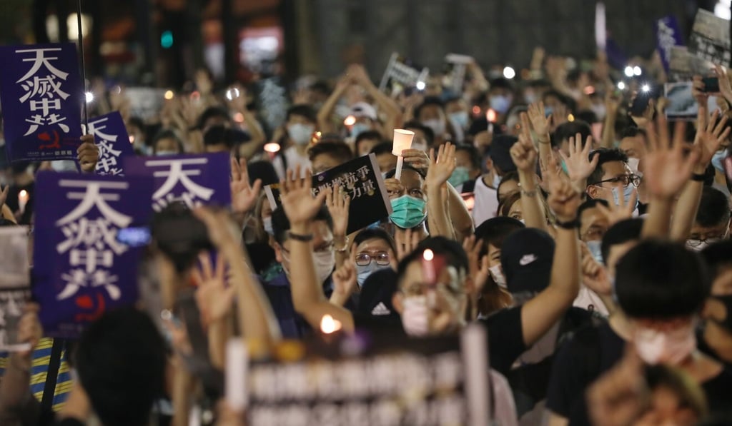 A crowd at the candlelight vigil in Victoria Park. Photo: Sam Tsang A crowd at the candlelight vigil in Victoria Park. Photo: Sam Tsang