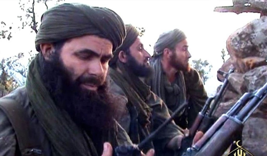 An undated image shows AQIM leader Abdelmalek Droukdel with his fighters in northern Mali. Photo: Al-Andalus via AFP