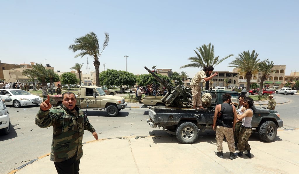 Fighters of Libya's UN-backed government celebrate in Tarhuna. Photo: Xinhua