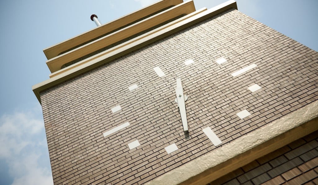 Kowloon’s landmark CLP Clock Tower remains one of the Hong Kong district’s few recognisable remaining pre-war features. Photo: CLP